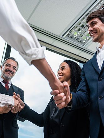 caucasian businessman making a handshake together